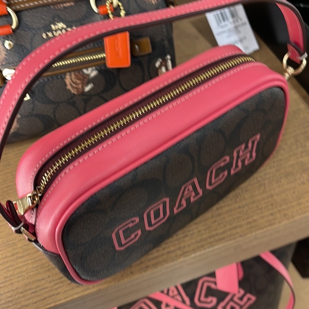 Coach Jamie Wristlet In Signature Canvas With Varsity Motif
IM/Brown/Watermelon - Picture 12 of 16